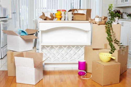 Experienced movers assisting with furniture transport in Woodford