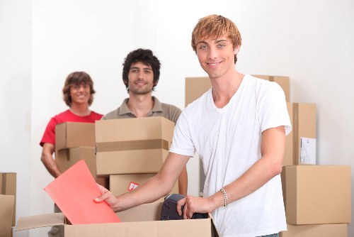 Professional movers assisting with a residential move in Barbican