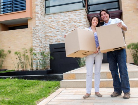 Knightsbridge movers loading a van with furniture